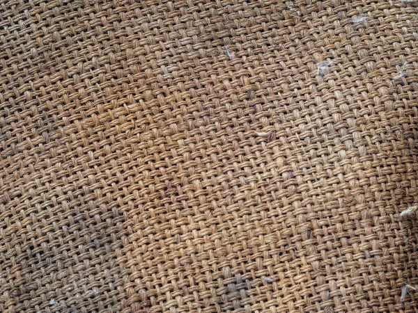 古い汚れたバラップをクローズアップ テクスチャされたバラップの背景 汚れた古いバラップの質感 編組糸網の構造 — ストック写真