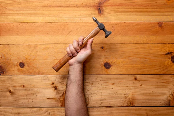Hand Grabbing Tinsmith Hammer Light Wooden Background Labor Day — Stock Photo, Image