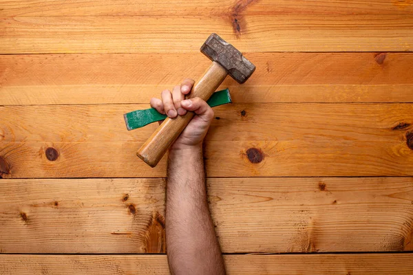 Hand Grabbing Hammer Chisel Light Wooden Background Labor Day — Stock Photo, Image