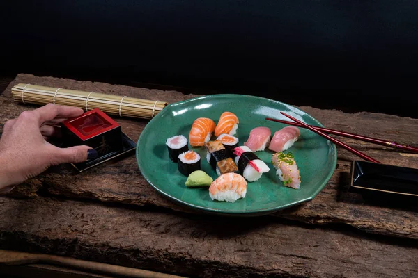 Holding Sake Nigiri Sushi Hossomaki Salmon Tuna Kani — Stock Photo, Image
