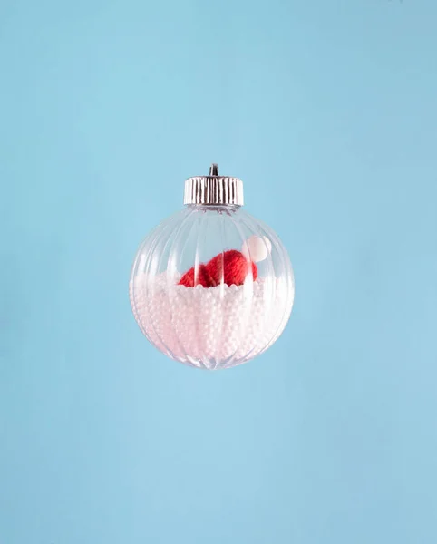 Transparent Decorative Bauble Artificial Snow Santa Claus Hat Pompom Minimal — Stock Photo, Image