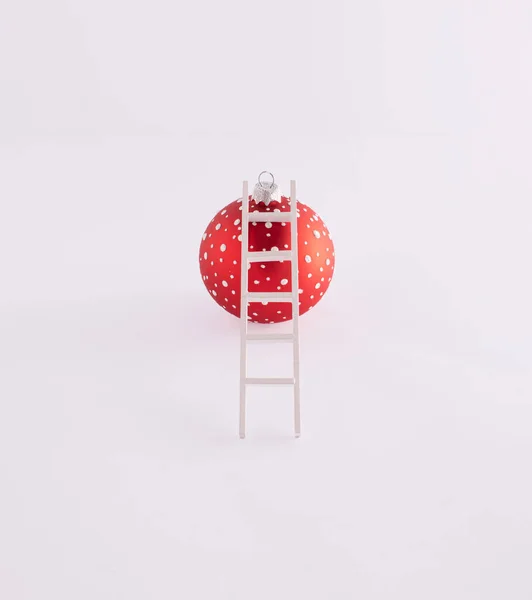 Red Christmas Decorating Bauble Polka Dot Patterned Ladders Leaned Minimal — Stock Photo, Image