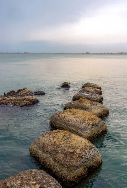 Step Stones In Blue rippling Water - Zen, life challenges, moving on, relax concept