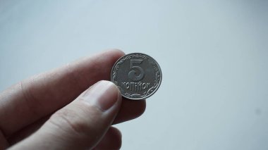 Ukrainian money - 5 kopecks.