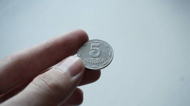 Ukrainian money - 5 kopecks.