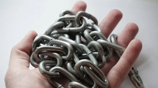 Rolled Metal Chain Hand — Zdjęcie stockowe