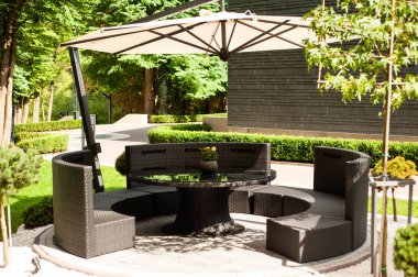 outdoor patio with chairs and garden