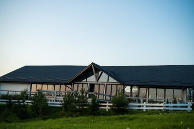 Front view of modern designed concrete residential house