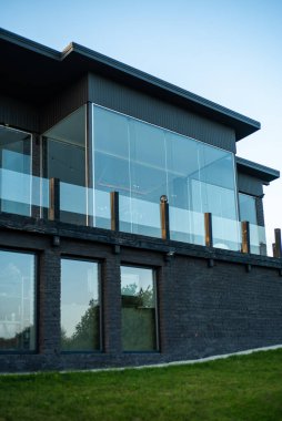 Front view of modern designed concrete residential house