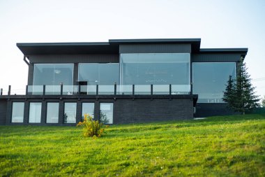 Front view of modern designed concrete residential house