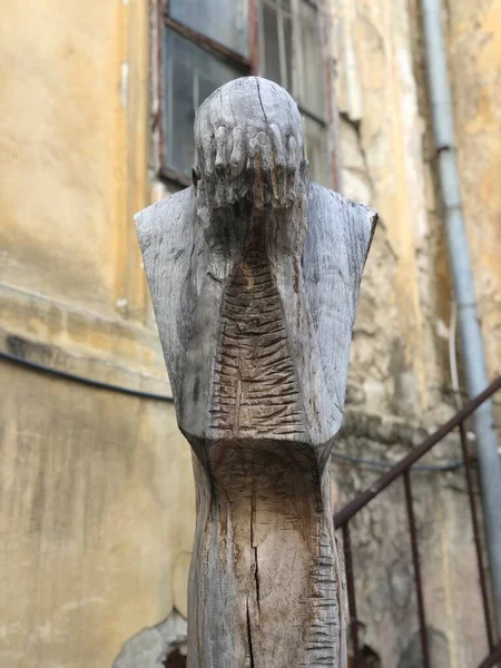 Old Wooden Statue Man Covering His Face Hands — Stock Photo, Image