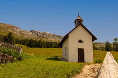 Landscapes, woods, narrow streets of the Dolomite Alps