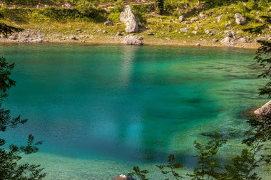 Lake Carezza is a small alpine lake in the Dolomites, italy.