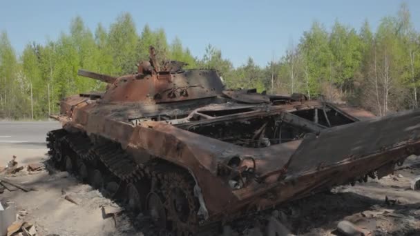 Burnt and destroyed armored personnel carrier of the Russian army as a result of the battle with the Ukrainian troops — стокове відео