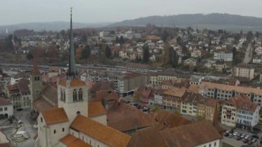 Aerial view of the old center and city hall of the town of Payerne in Switzerland. 4K