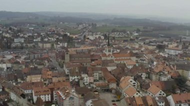 Aerial view of the old center and city hall of the town of Payerne in Switzerland. 4K