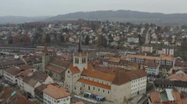 Aerial view of the old center and city hall of the town of Payerne in Switzerland. 4K