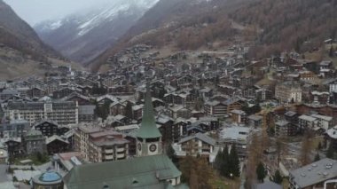 Aerial view of Zermatt in Switzerland in autumn. 4K