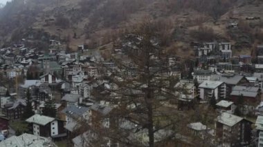 Aerial view of Zermatt in Switzerland in autumn. Alps 4K