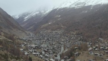 Aerial view of Zermatt in Switzerland in autumn. Alps 4K