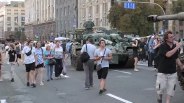 KYIV, UKRAINE - AUG 22, 2022: Destroyed Russian military equipment in the center of Kyiv on Khreshchatyk. People inspect and photograph captured Russian tanks on Ukraines Independence Day.