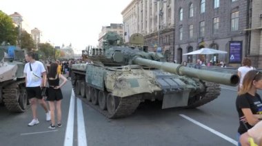 KYIV, UKRAINE - AUG 22, 2022: Destroyed Russian military equipment in the center of Kyiv on Khreshchatyk. People inspect and photograph captured Russian tanks on Ukraines Independence Day.