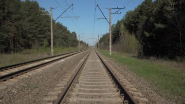 Camera moves along the railroad. 4K