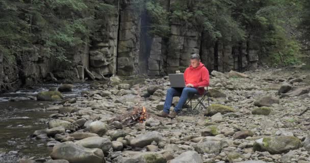 Man Works Laptop Stream Nature Concept Freelancing Digital Nomad Remote — 비디오
