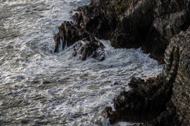Güney Yığını Deniz Feneri Kutsal Ada 'nın kuzey batı kıyısında küçük bir adada Anglesey, Galler, İngiltere