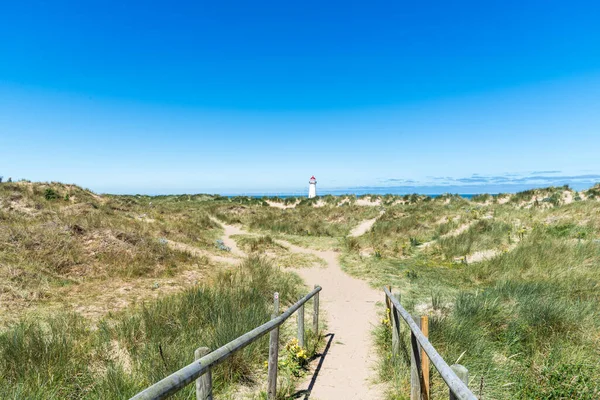 Beach in sunny day small, Talacre in Wales, view lighthouse.