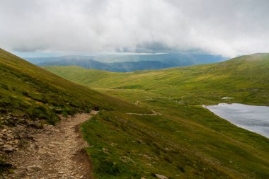 National Park Lake District, Helvellyn Hills, view while climbing Lake Thirlmere and Red Tarm, crossing Striding Edge and Swirral Edge during fog, 2022.