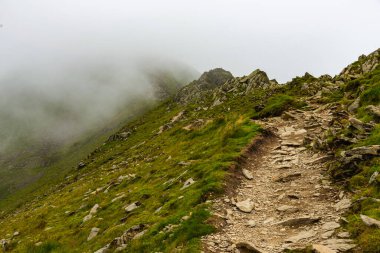 National Park Lake District, Helvellyn Hills, view while climbing Lake Thirlmere and Red Tarm, crossing Striding Edge and Swirral Edge during fog, 2022.