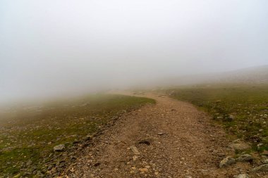 National Park Lake District, Helvellyn Hills, view while climbing Lake Thirlmere and Red Tarm, crossing Striding Edge and Swirral Edge during fog, 2022.
