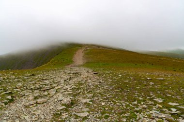 National Park Lake District, Helvellyn Hills, view while climbing Lake Thirlmere and Red Tarm, crossing Striding Edge and Swirral Edge during fog, 2022.