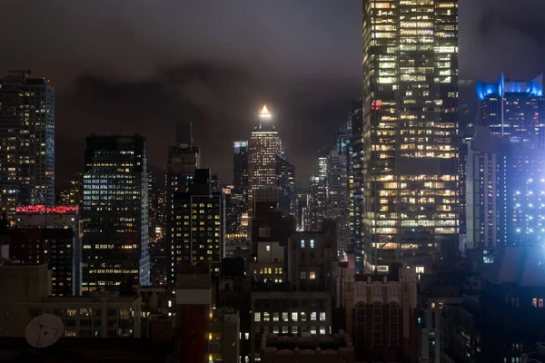 Manhattan interior view from a high floor at night in NYC, New York