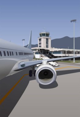 Dağlardaki havaalanı, terminalin yanındaki uçak yolcuları bekliyor..