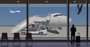 Havaalanı terminalinde bir yolcu, pencerenin dışında bir uçak ve bir iskele var..