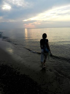 Beautiful sunset on the Baltic Sea. A walk along the seashore during your vacation. Perfect wallpaper.