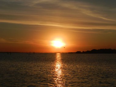Beautiful sunset on the Baltic Sea. A walk along the seashore during your vacation. Perfect wallpaper.