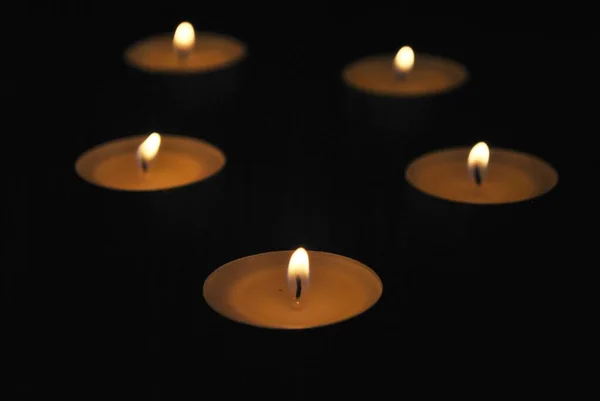 Burning Candles Dark Room Tealight Flames Light Darkness — стоковое фото