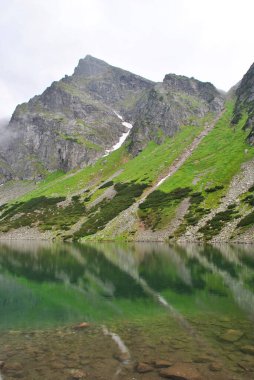 Beautiful lake in the national park. Tatry mountains. Spring Summer. 