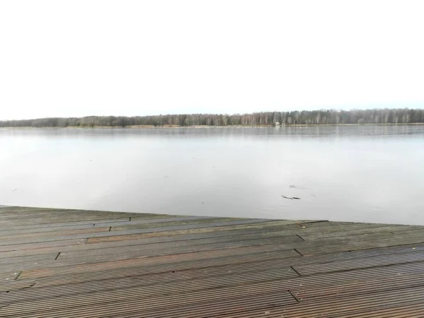 An atmospheric sunset over a beautiful lake in the park. 