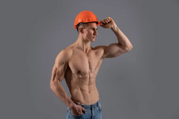 Shirtless construction man with fit torso wear hard hat grey background, constructor — Stock Photo, Image