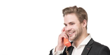 Eski usul sabit hattı elimde hissediyorum. Mutlu adam telefonda konuşuyor. Telefon görüşmesi yöneticisi.