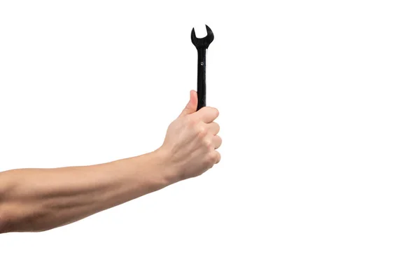 Chave de mão masculina. construção e reparação de ferramentas. mão com ferramenta de reparo — Fotografia de Stock