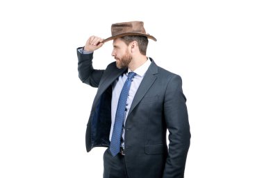 İnsanı Teksas 'tan çıkaramazsın. Ciddi iş adamı kovboy şapkasını tamir eder. Profesyonel adam.