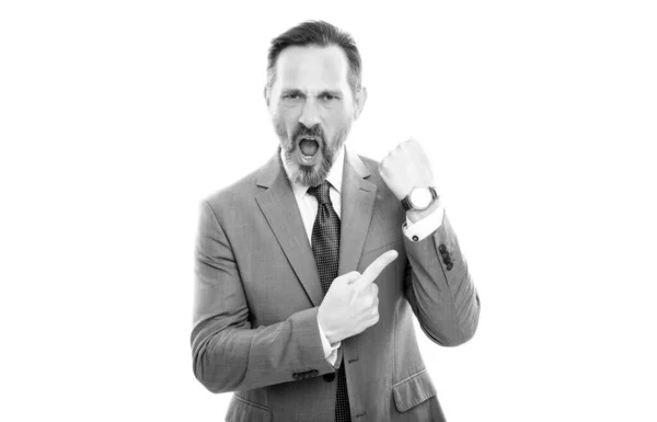 Angry mature director in suit pointing finger on time on watch isolated on white, late. — Stock Photo, Image