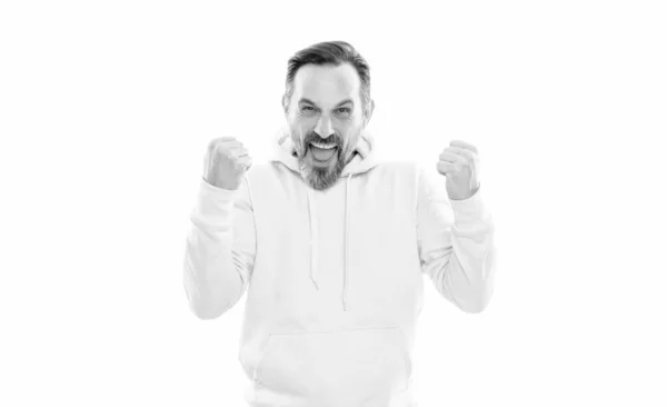 Happy handsome mature man with beard in hoody celebrate success isolated on white, success. — Stockfoto