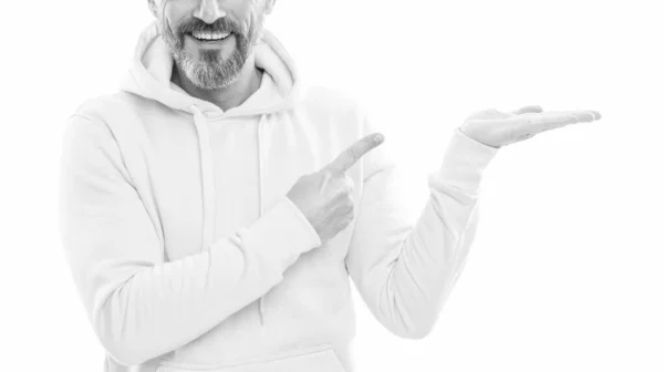 Look over there. cropped guy presenting product isolated on white. advisor man in yellow hoody. — Stock Photo, Image