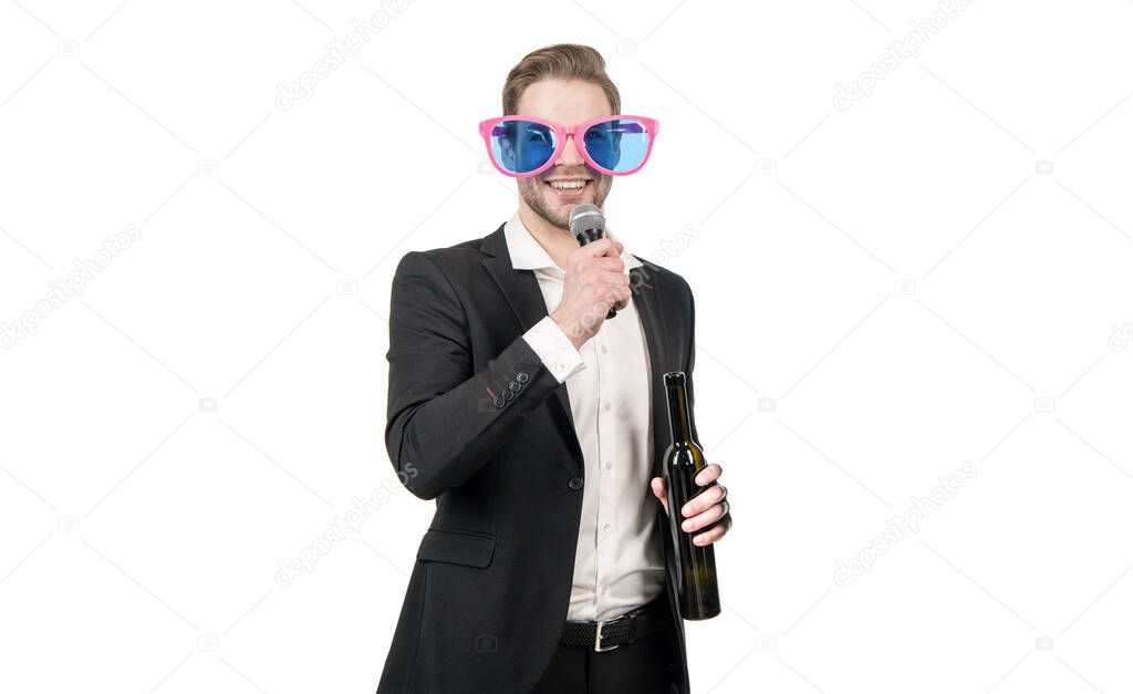Happy guy conferencier give toast with wine to microphone, toastmaster